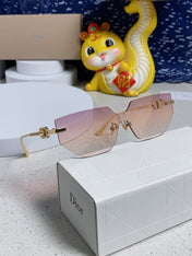 MONTAIGNE SUNGLASS 563191 IN GOLD METAL PINK SMOKE LENSES