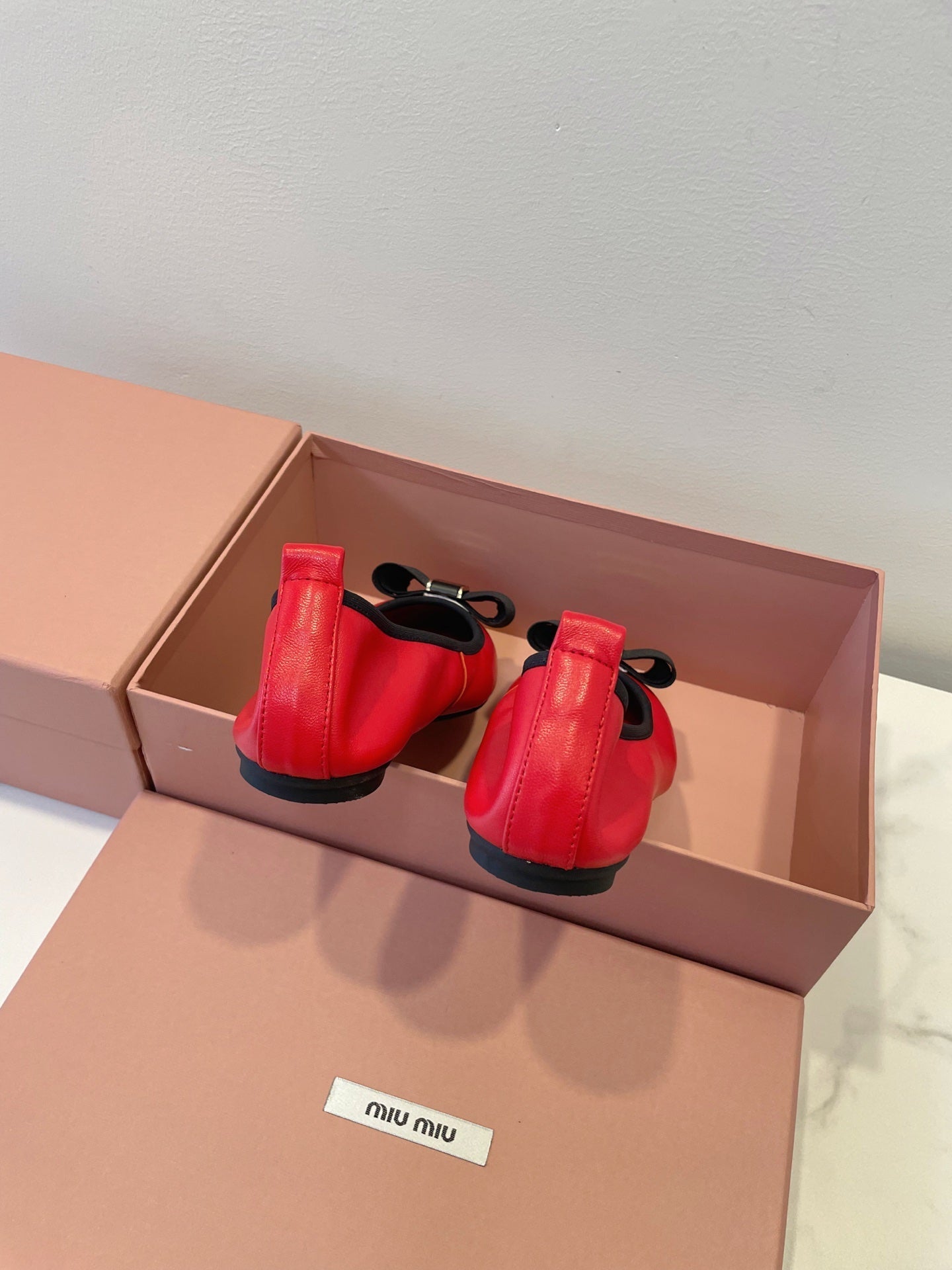 MIUMIU 26S BALLET FLATS IN RED CALFSKIN WITH BOW