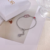 CD 26S PAVE LOGO RED CRYSTAL BRACELET IN SILVER TONE METAL 631790