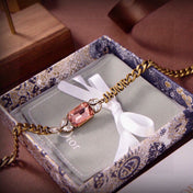 CD 26S DIOR LOGO PINK CRYSTAL CHAIN NECKLACE IN AGED GOLD METAL 633118