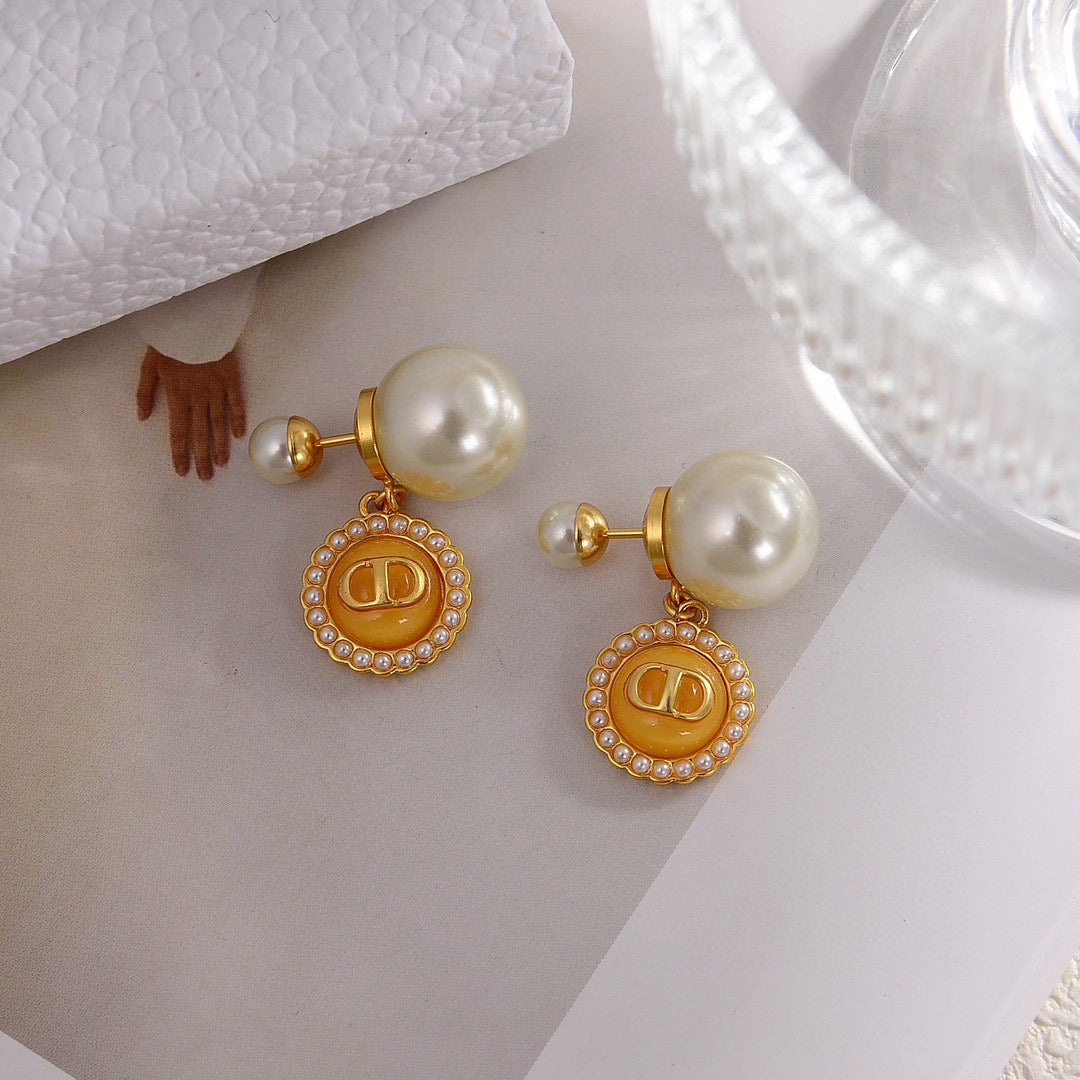 CD 26S DOUBLE PEARL MEDALLION LOGO DROP EARRINGS IN GOLD METAL