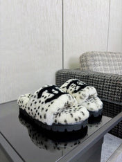 CHANEL 26S PLATFORM SLIDE SANDALS IN WHITE AND BLACK SHEARLING DALMATIAN PRINT