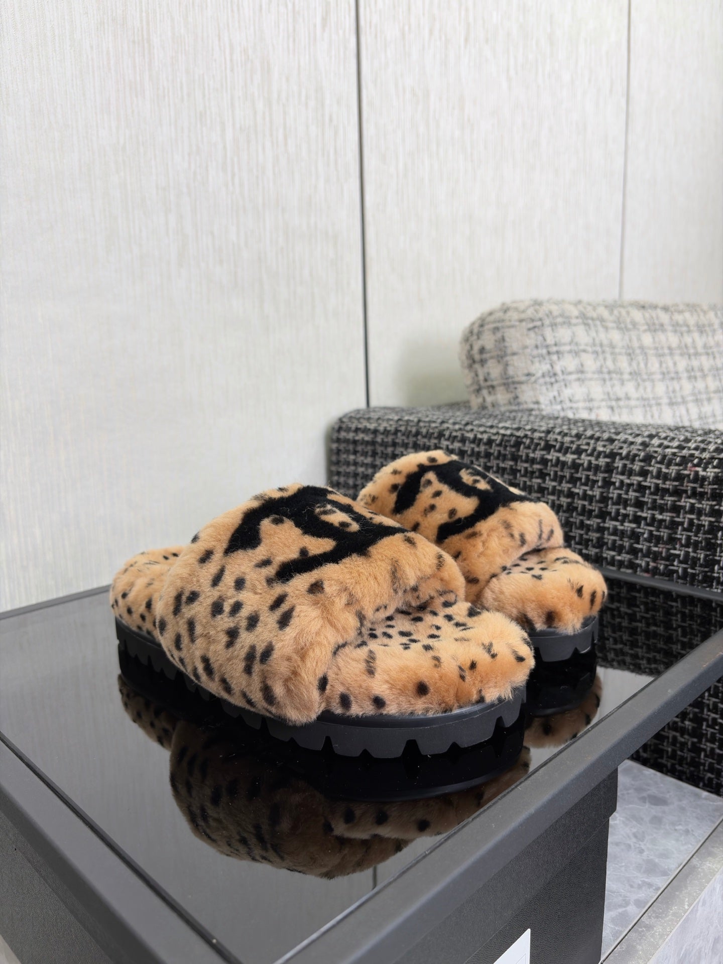 CHANEL 26S PLATFORM SLIDE SANDALS IN CAMEL AND BLACK SHEARLING DALMATIAN PRINT