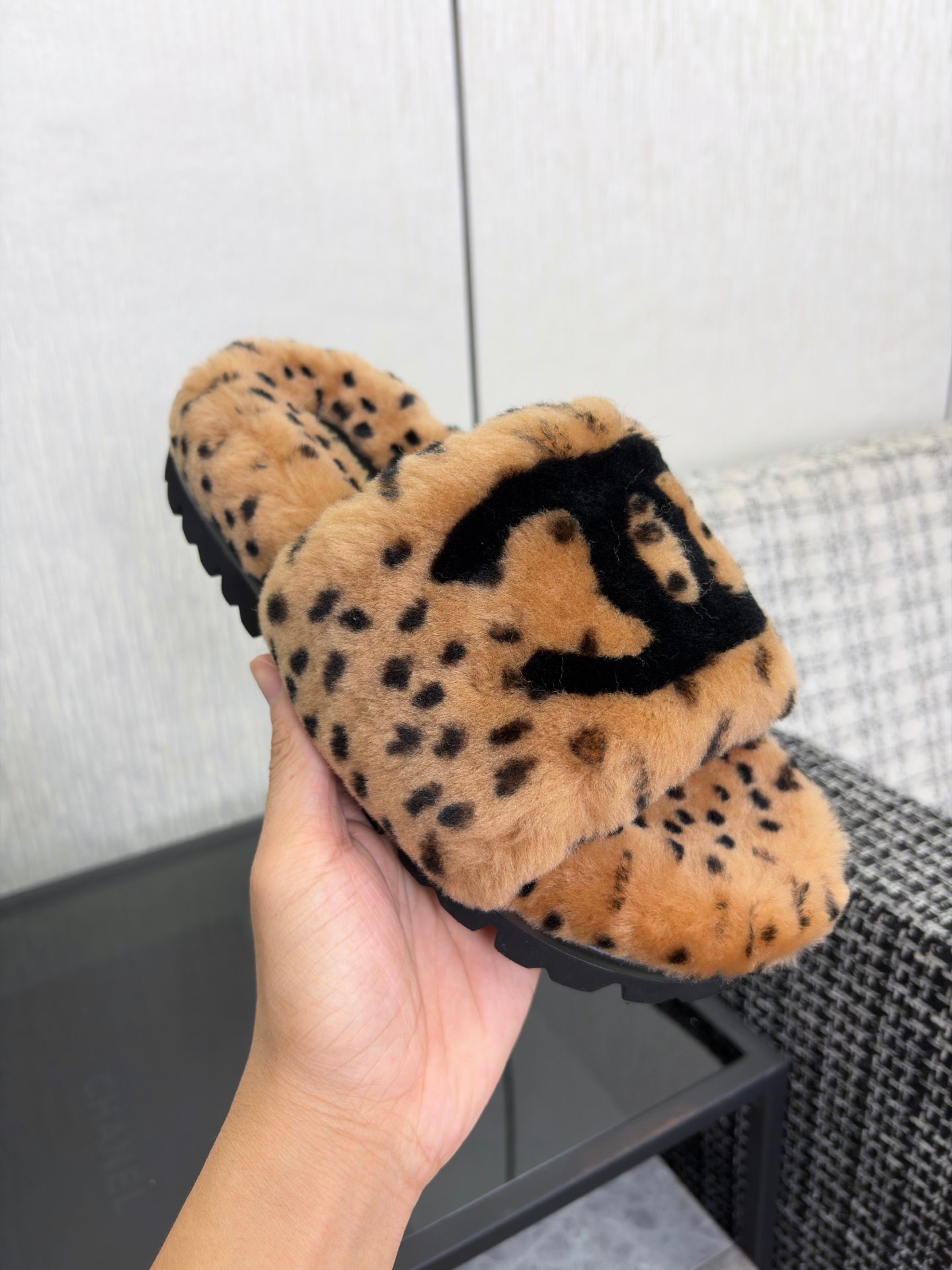CHANEL 26S PLATFORM SLIDE SANDALS IN CAMEL AND BLACK SHEARLING DALMATIAN PRINT