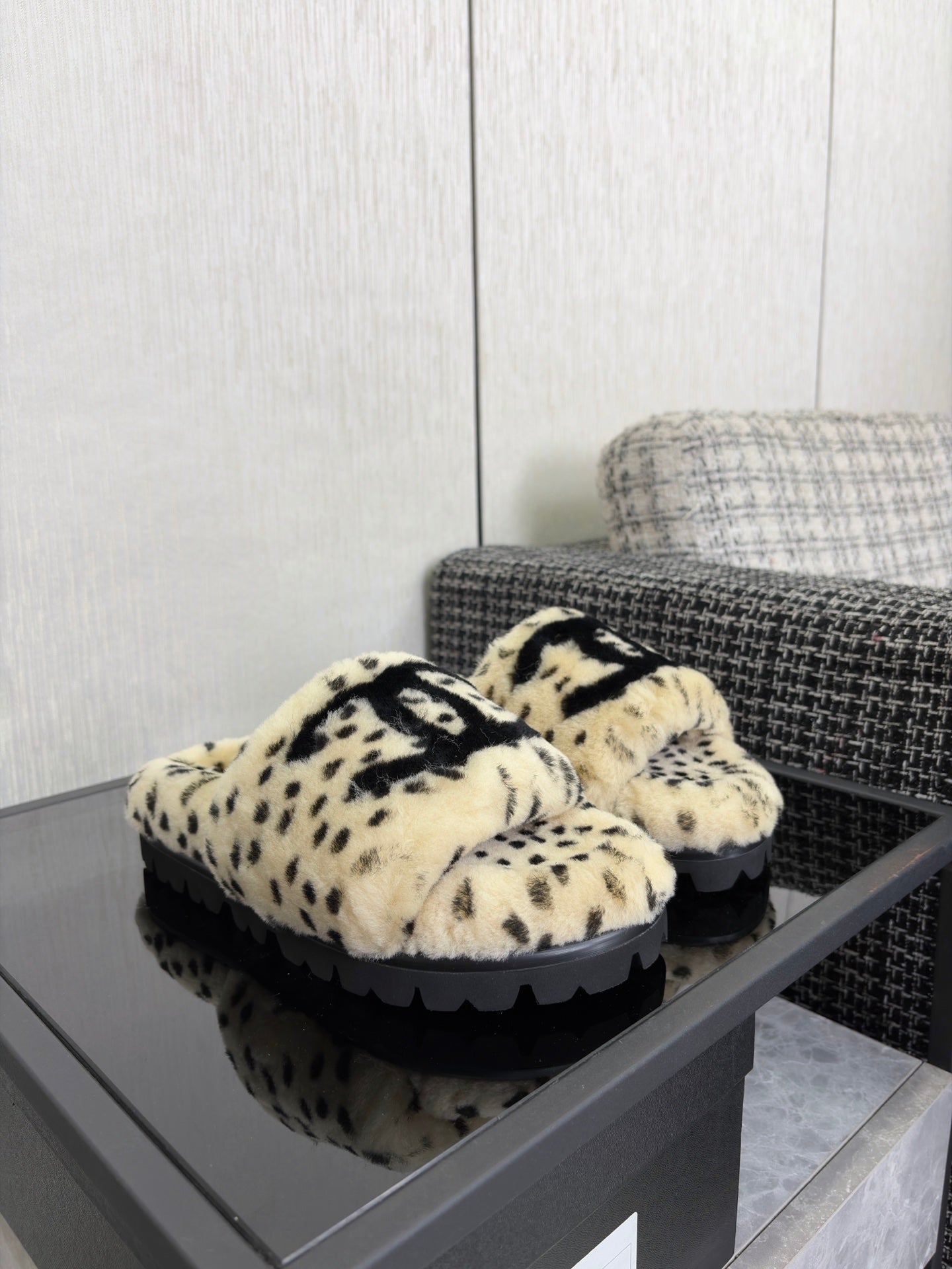 CHANEL 26S PLATFORM SLIDE SANDALS IN BEIGE AND BLACK SHEARLING DALMATIAN PRINT