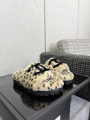 CHANEL 26S PLATFORM SLIDE SANDALS IN BEIGE AND BLACK SHEARLING DALMATIAN PRINT