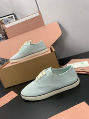 MIUMIU 26S LACE UP SNEAKERS IN PALE MINT CANVAS RUBBER SOLE
