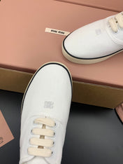 MIUMIU 26S LACE UP SNEAKERS IN WHITE CANVAS RUBBER SOLE