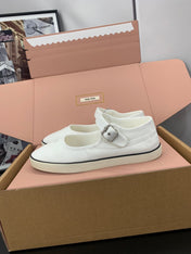 MIUMIU 26S MARY JANE FLATS IN WHITE CANVAS LOGO