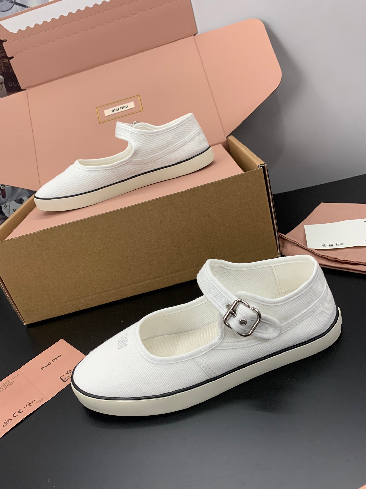 MIUMIU 26S MARY JANE FLATS IN WHITE CANVAS LOGO