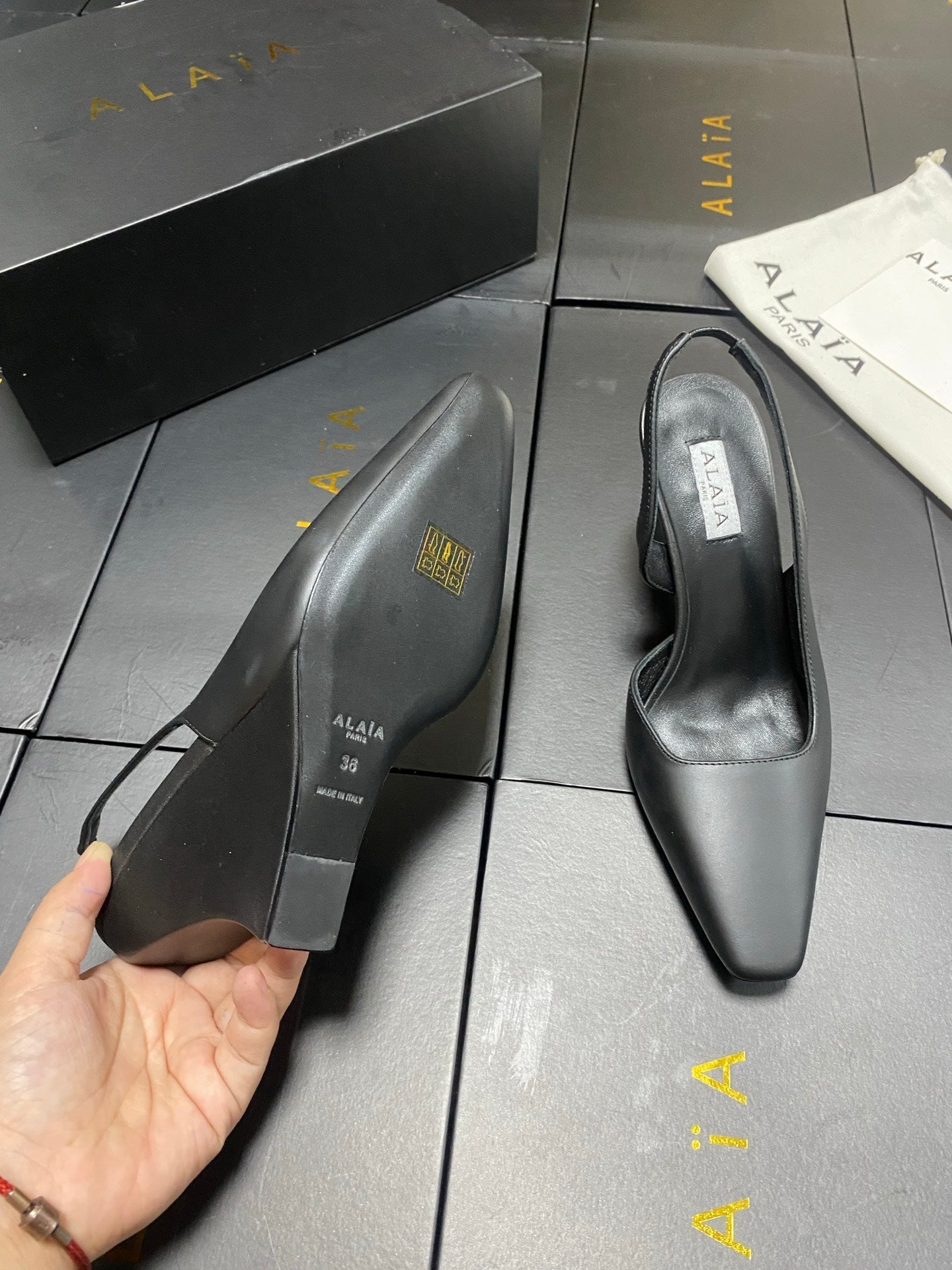 ALAIA 26S WEDGE SLINGBACKS 95 MM IN BLACK CALFSKIN