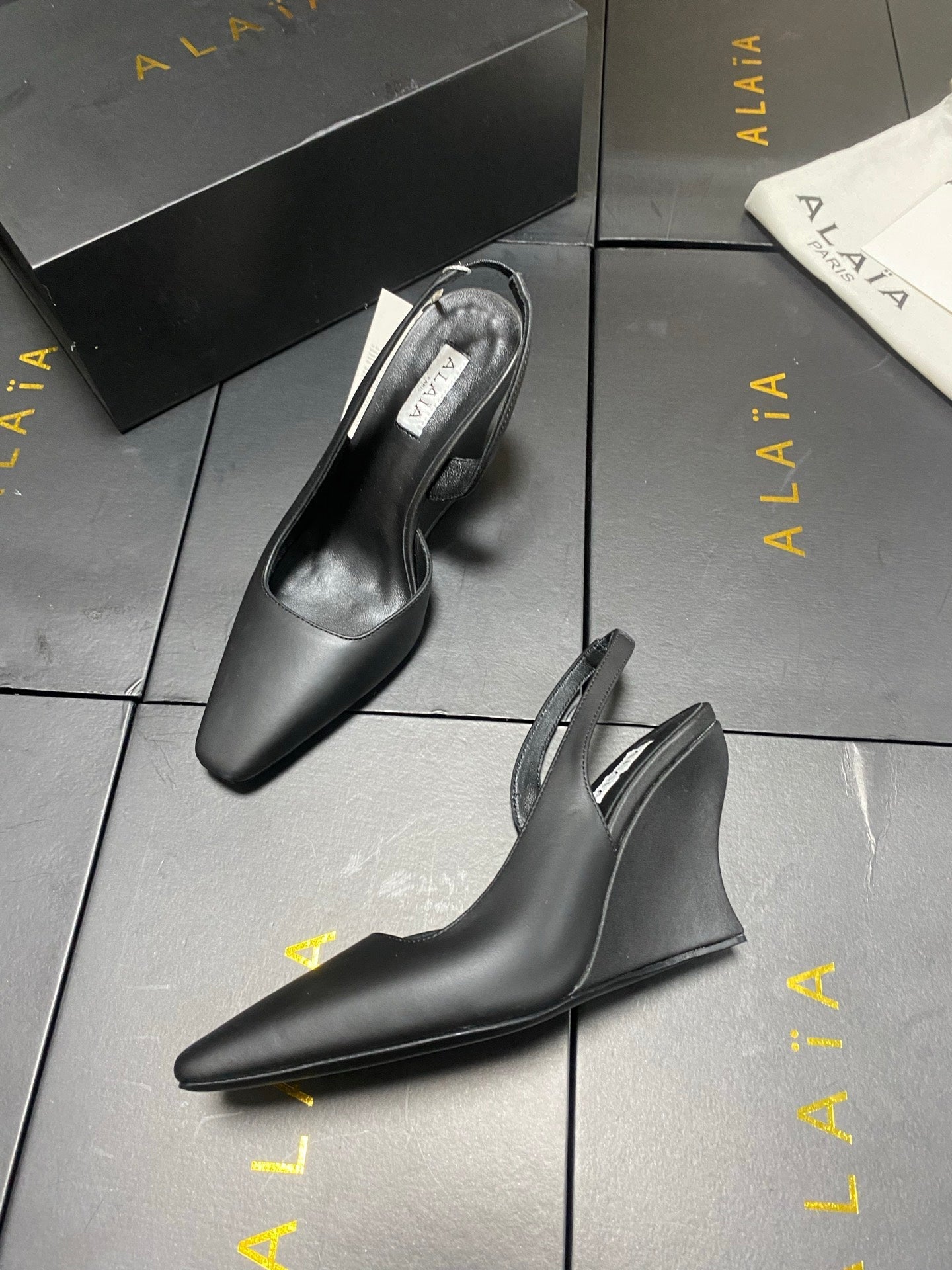 ALAIA 26S WEDGE SLINGBACKS 95 MM IN BLACK CALFSKIN