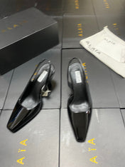 ALAIA 26S WEDGE SLINGBACKS 95 MM IN BLACK PATENT CALFSKIN