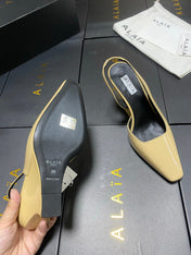 ALAIA 26S WEDGE SLINGBACKS 95 MM IN BEIGE PATENT CALFSKIN