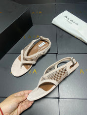 ALAIA 26S FLAT MESH THONG SANDALS IN BEIGE SUEDE