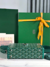 CASSETTE TRUNK BAG 21 IN GREEN GOYARDINE CANVAS & CLAMECY COWHIDE