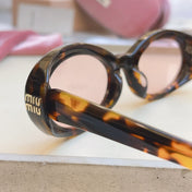 MIUMIU 26S OVAL FRAME IN ACETATE 415248
