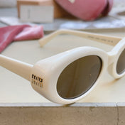 MIUMIU 26S OVAL FRAME IN ACETATE 415249