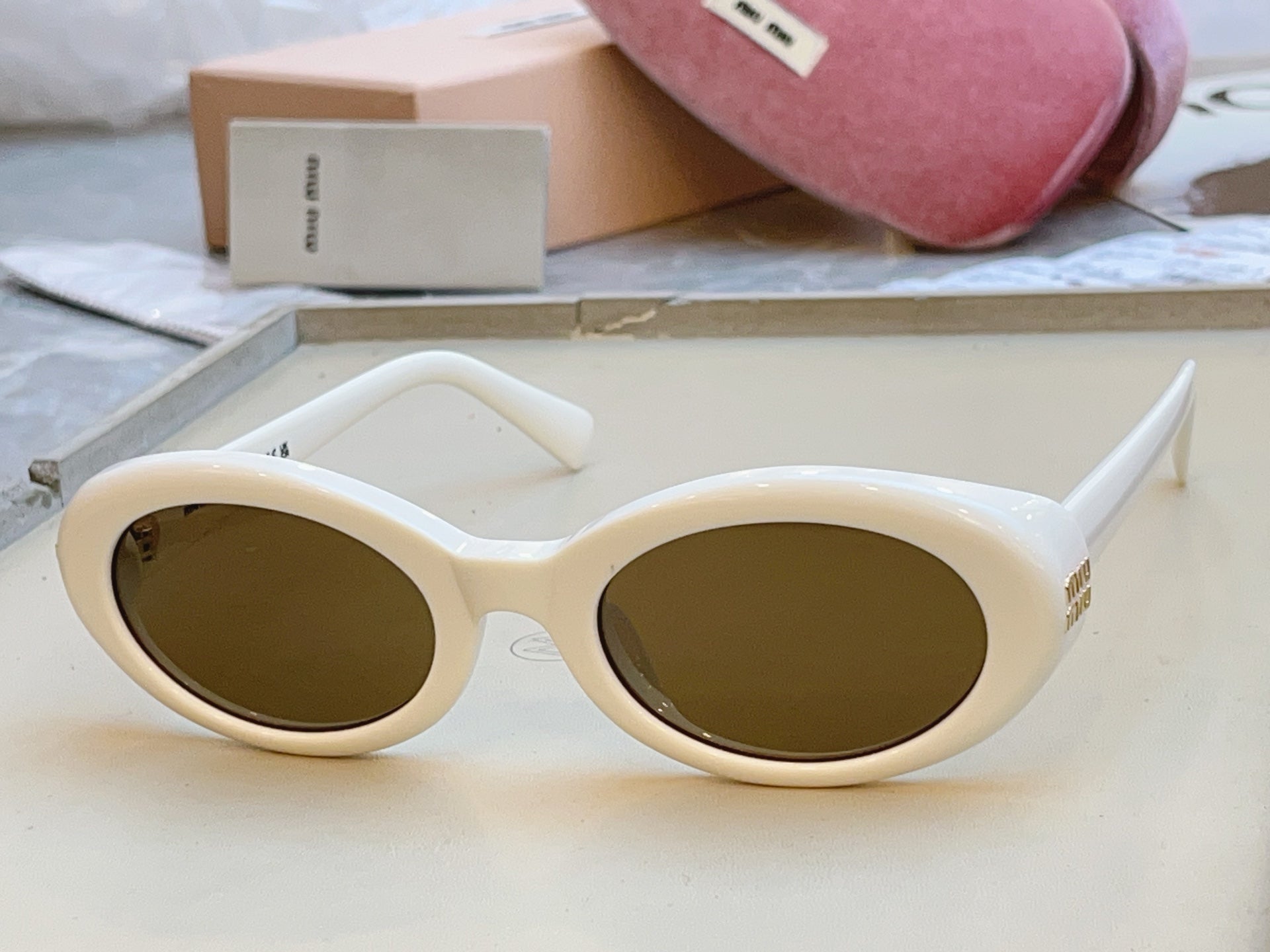 MIUMIU 26S OVAL FRAME IN ACETATE 415249