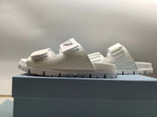 PRADA 26S STRAP SLIDES IN IVORY WHITE CROC EMBOSSED CALFSKIN