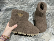PRADA 26S ANKLE BOOTS IN DARK BROWN FUR