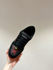 GUCCI 26S SCREENER SNEAKER IN BLACK AND RED GG CANVAS
