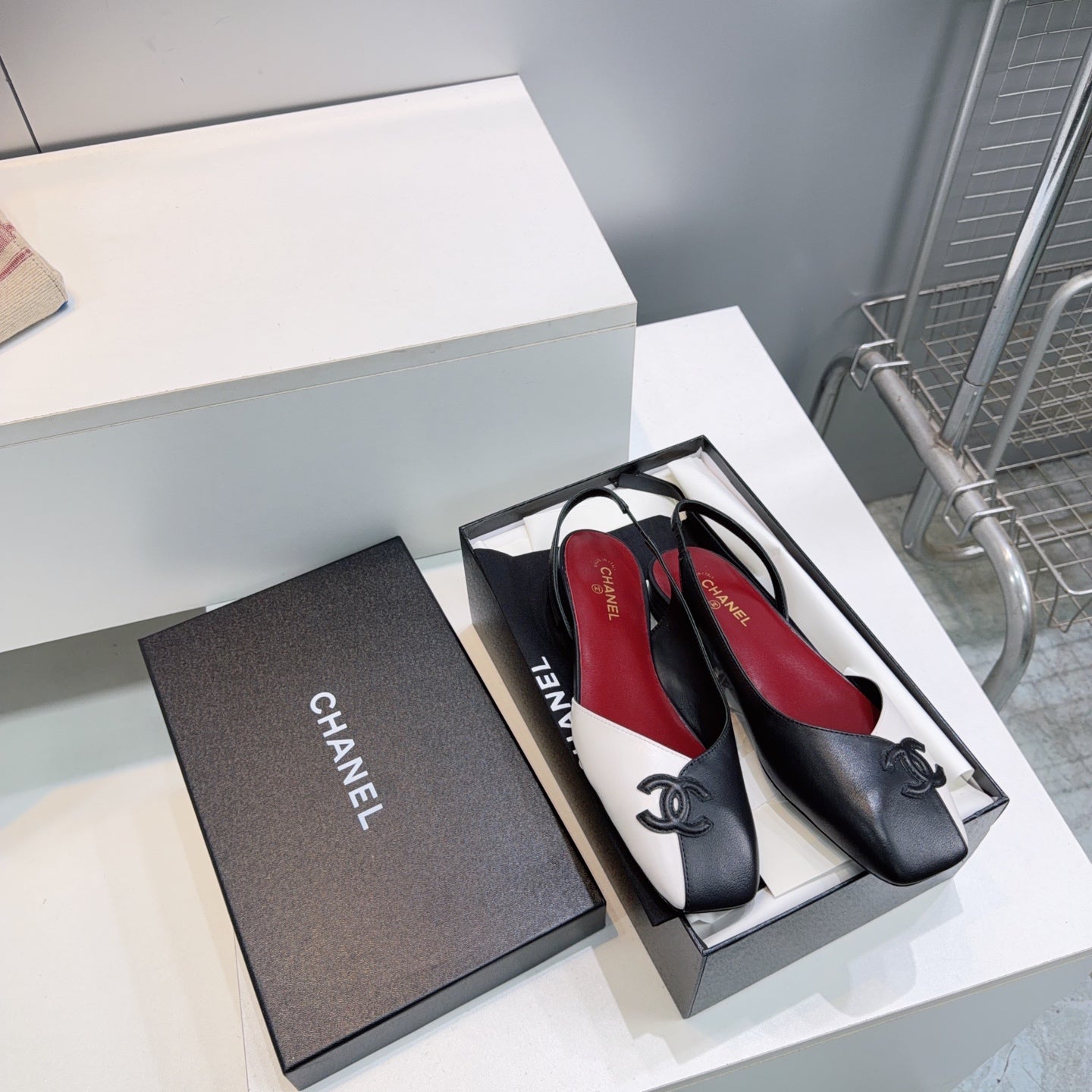CHANEL 26S FLAT SLINGBACK IN BLACK AND WHITE LAMBSKIN