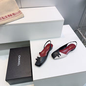 CHANEL 26S FLAT SLINGBACK IN BLACK AND WHITE LAMBSKIN