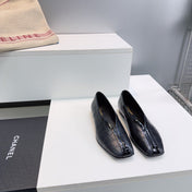 CHANEL 26S SQUARE-TOE FLATS IN BLACK CROCODILE-EMBOSSED LAMBSKIN