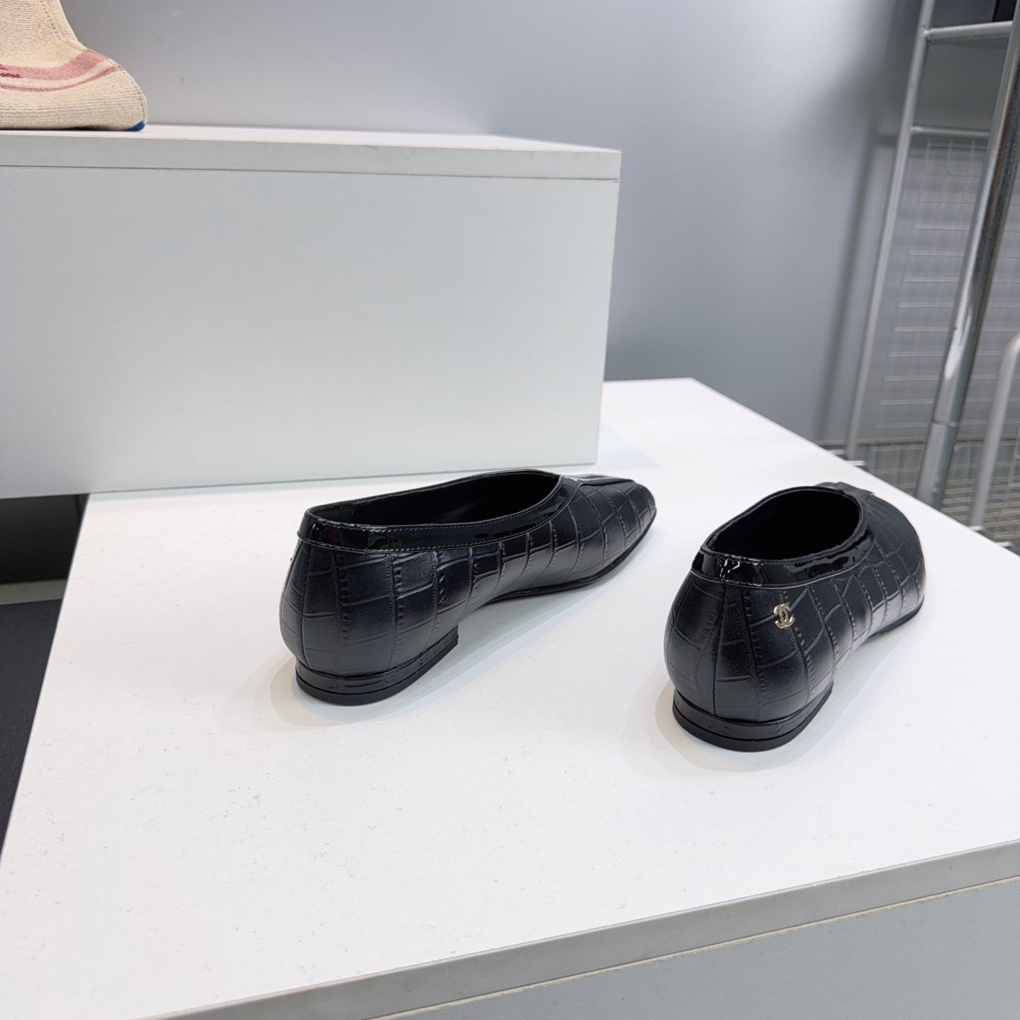 CHANEL 26S SQUARE-TOE FLATS IN BLACK CROCODILE-EMBOSSED LAMBSKIN