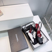 CHANEL 26S SLINGBACK 100 MM IN BLACK AND WHITE LAMBSKIN