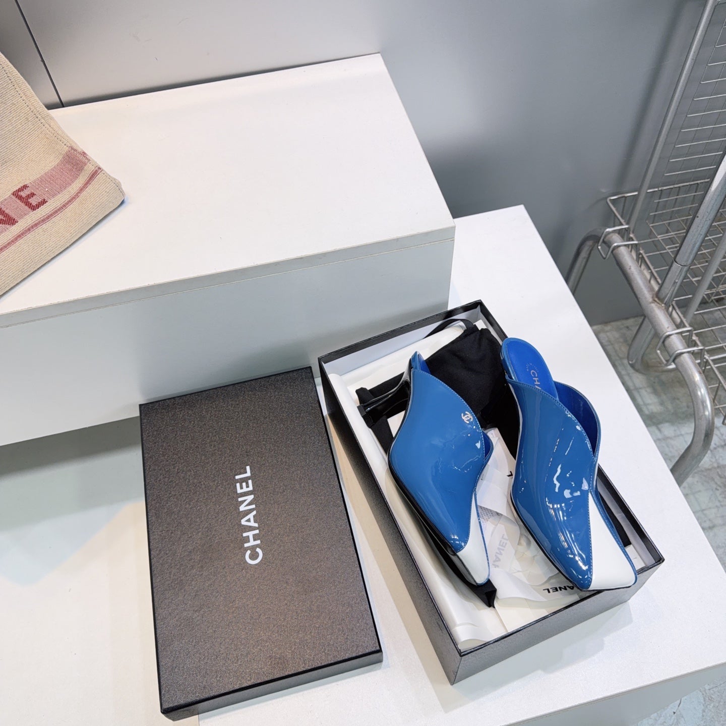 CHANEL 26S HIGH-HEEL MULES 70 MM IN BLUE AND WHITE LAMBSKIN
