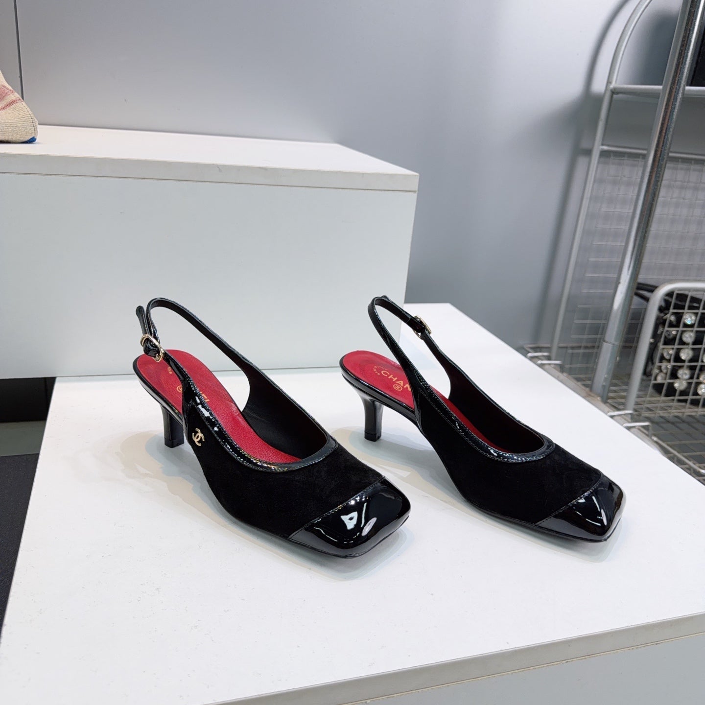 CHANEL 26S HIGH HEEL SLINGBACK PUMPS 65 MM IN BLACK LAMBSKIN AND SUEDE