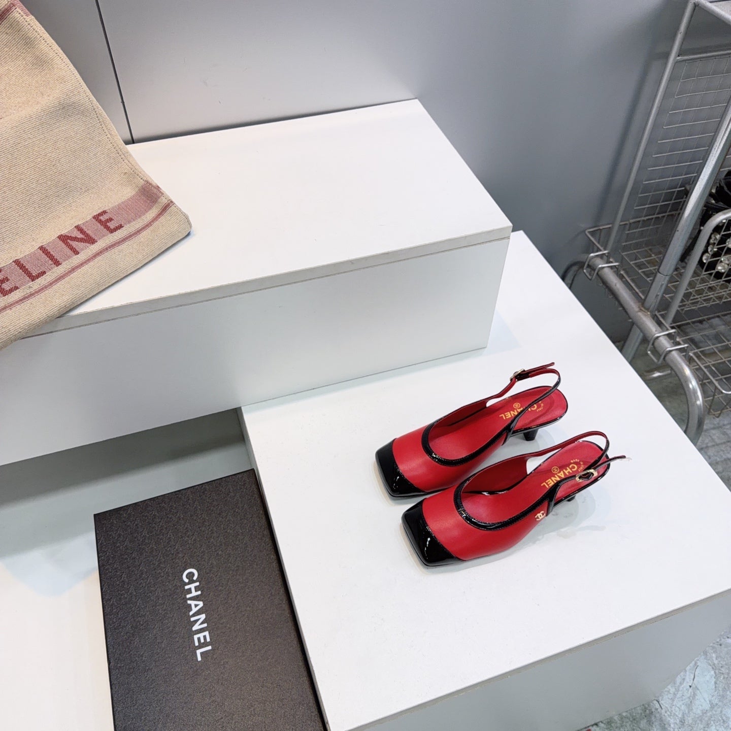 CHANEL 26S HIGH HEEL SLINGBACK PUMPS 65 MM IN BLACK AND RED LAMBSKIN