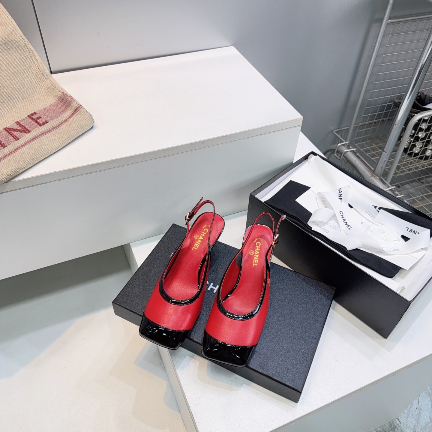 CHANEL 26S HIGH HEEL SLINGBACK PUMPS 65 MM IN BLACK AND RED LAMBSKIN