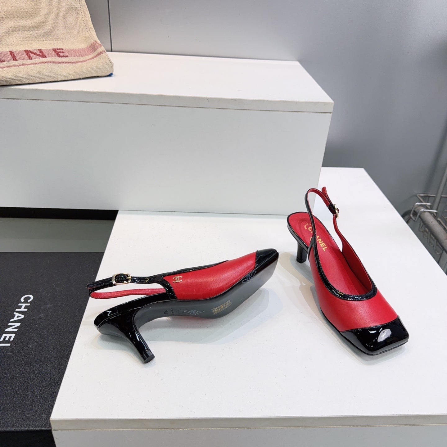 CHANEL 26S HIGH HEEL SLINGBACK PUMPS 65 MM IN BLACK AND RED LAMBSKIN
