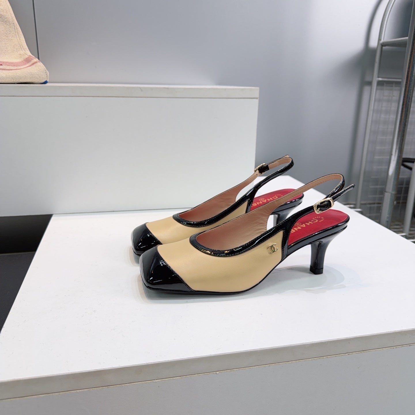 CHANEL 26S HIGH HEEL SLINGBACK PUMPS 65 MM IN BLACK AND BEIGE LAMBSKIN