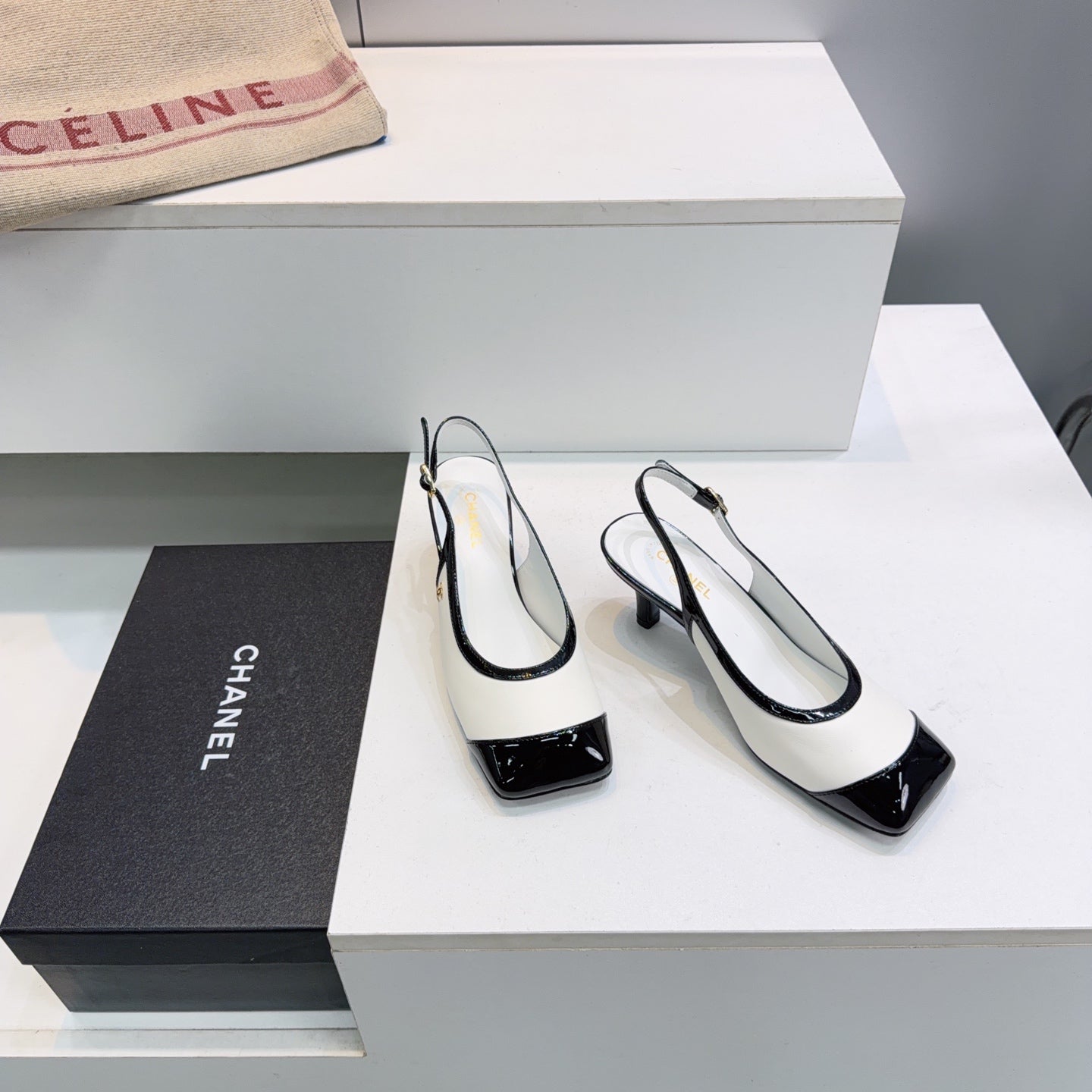 CHANEL 26S HIGH HEEL SLINGBACK PUMPS 65 MM IN BLACK AND WHITE LAMBSKIN
