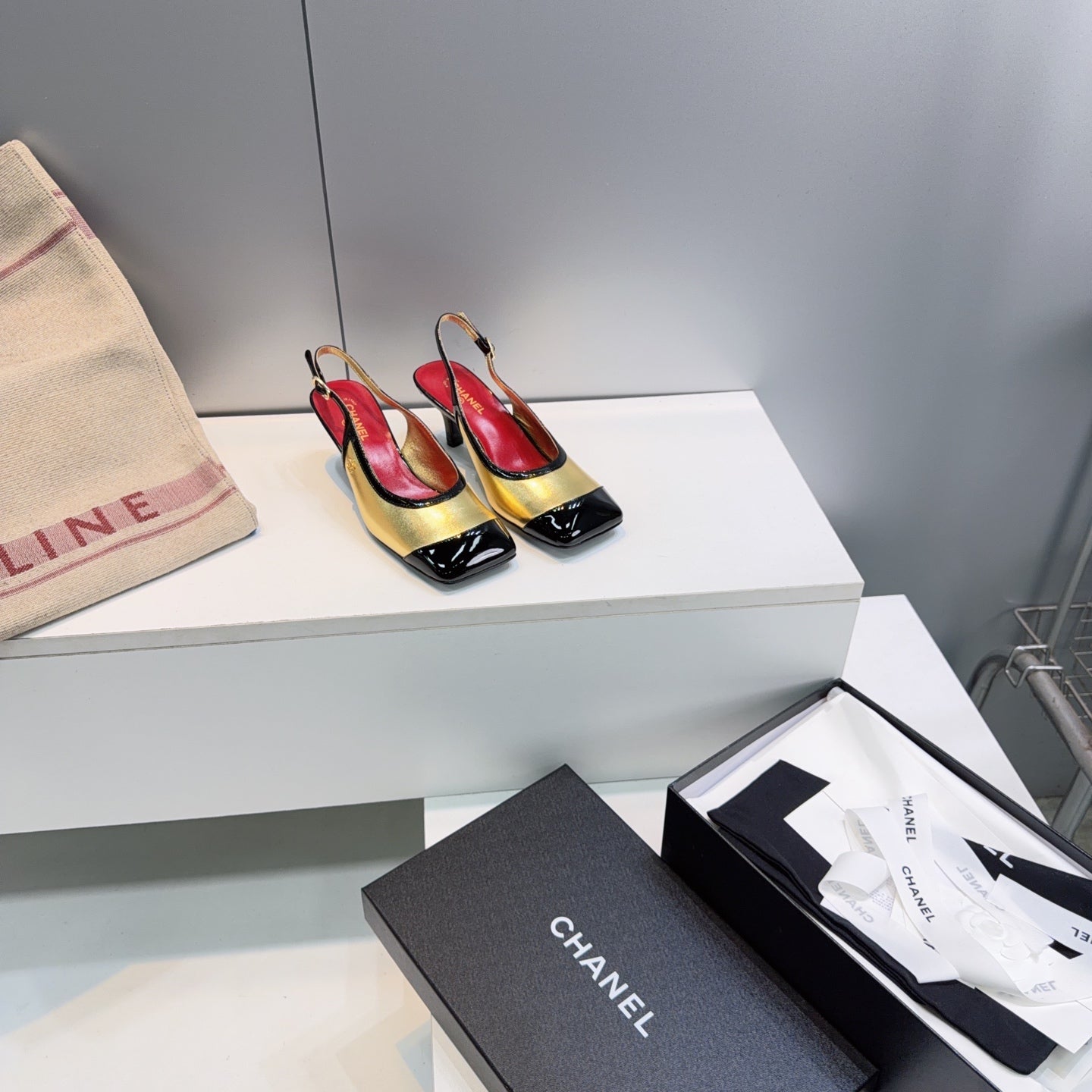 CHANEL 26S HIGH HEEL SLINGBACK PUMPS 65 MM IN BLACK AND GOLD LAMBSKIN