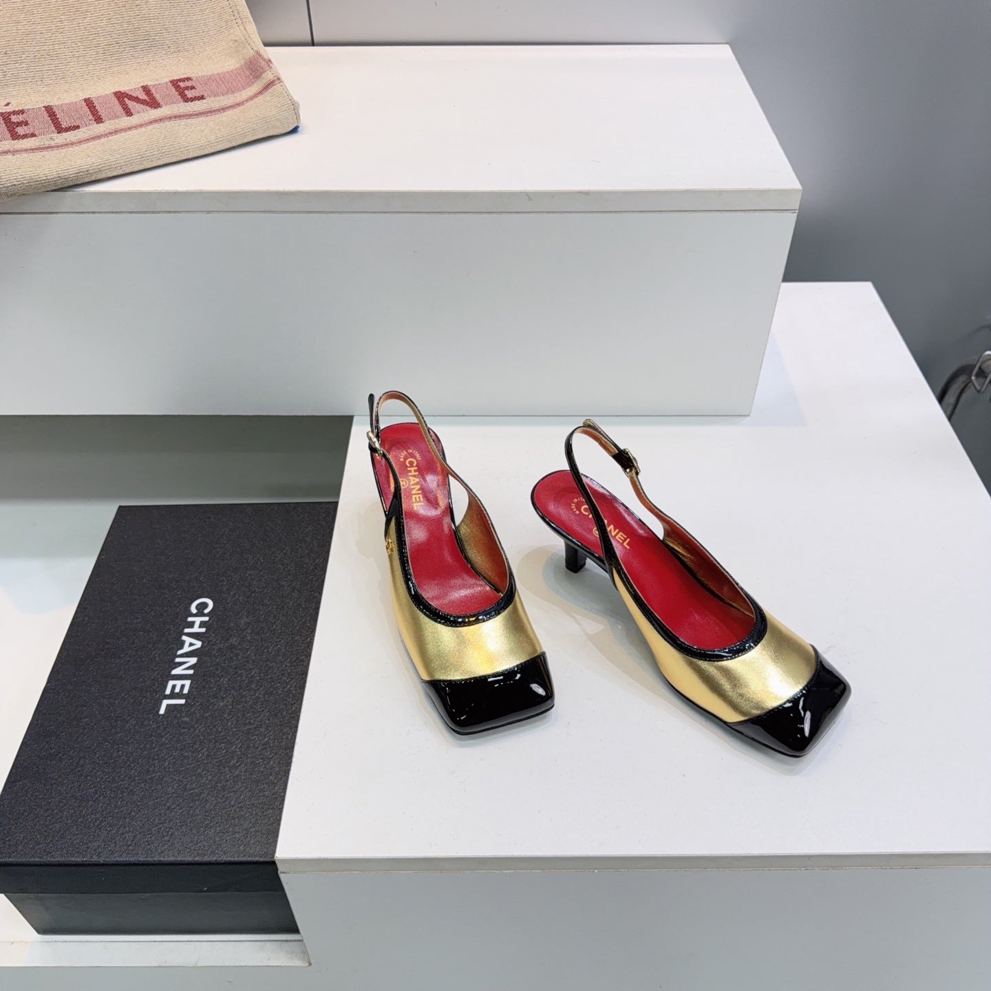 CHANEL 26S HIGH HEEL SLINGBACK PUMPS 65 MM IN BLACK AND GOLD LAMBSKIN