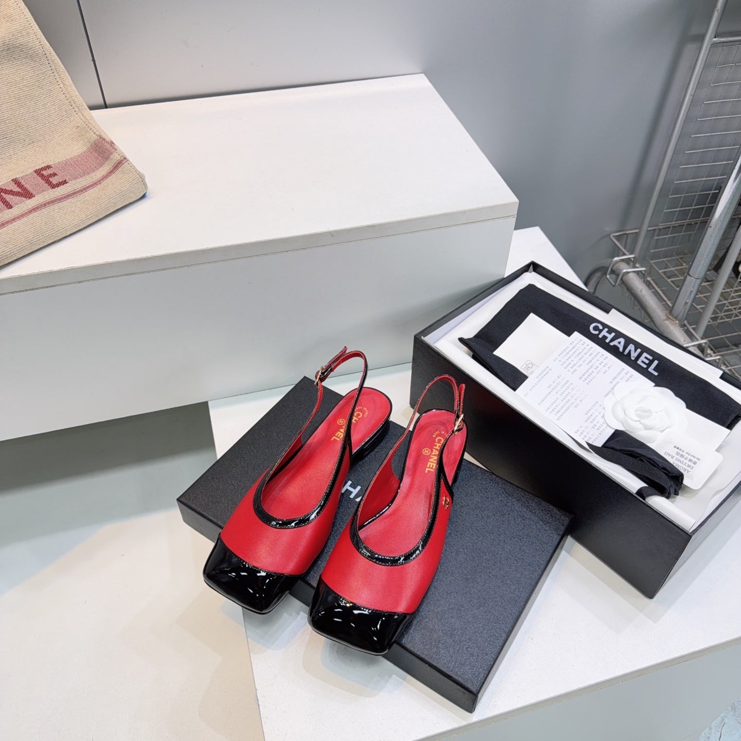 CHANEL 26S SLINGBACK PUMPS IN BLACK AND RED PATENT LAMBSKIN