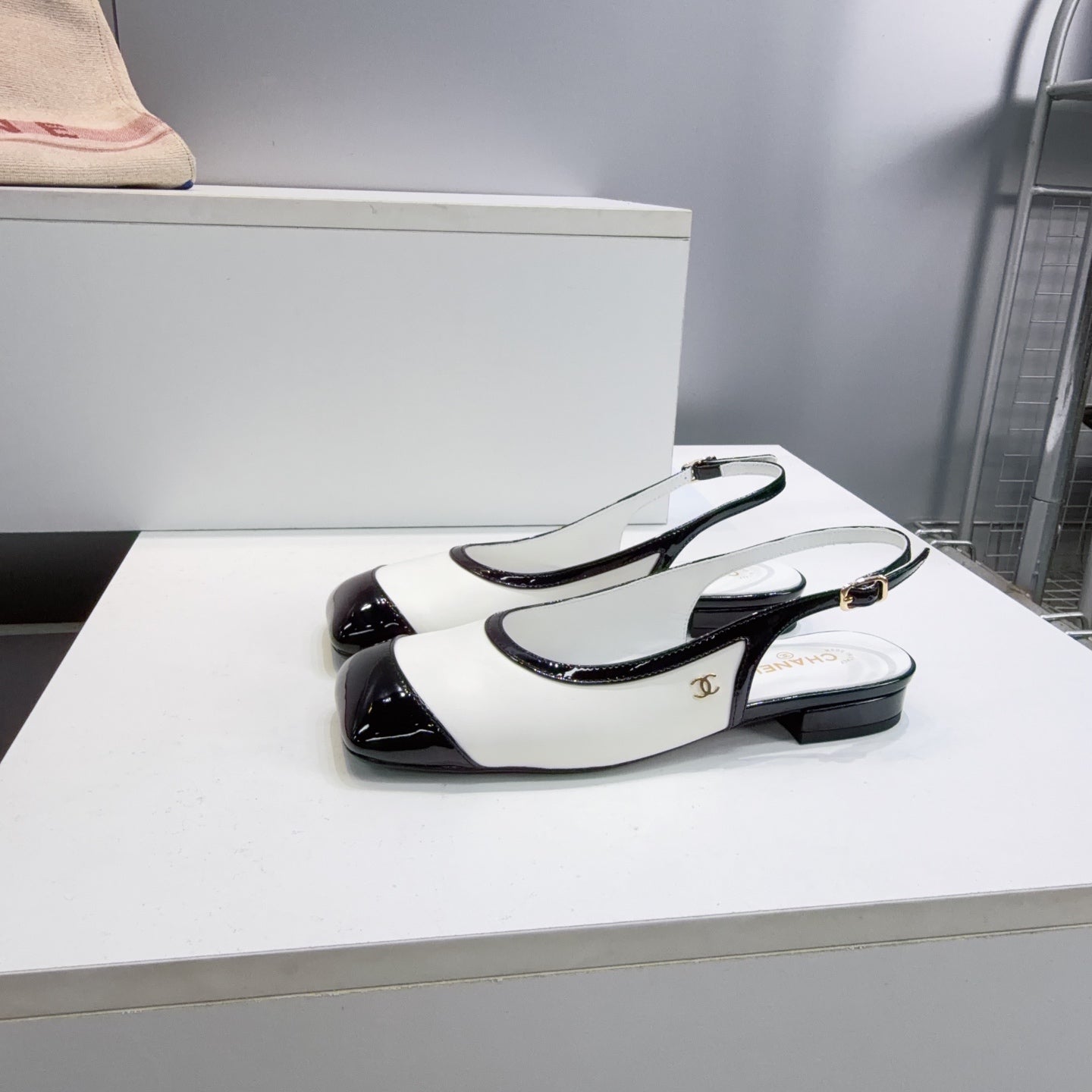 CHANEL 26S SLINGBACK PUMPS IN BLACK AND WHITE PATENT LAMBSKIN