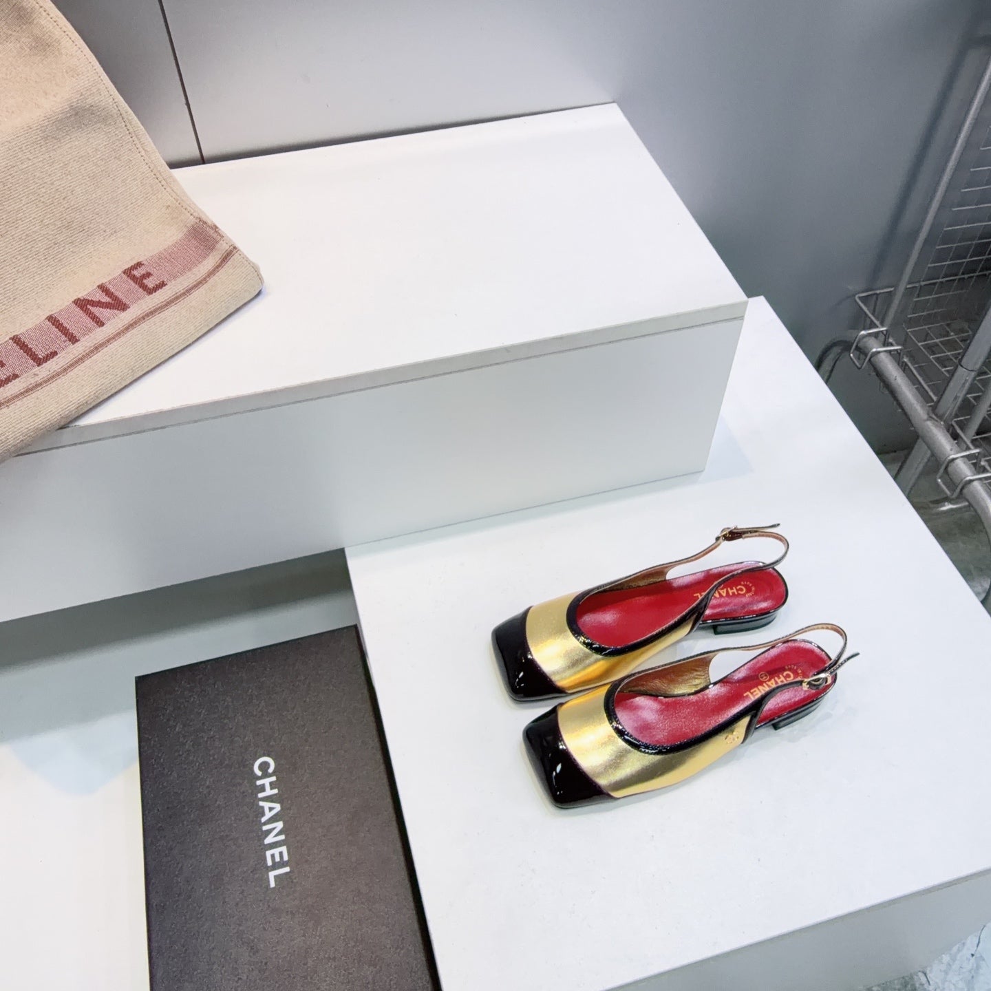 CHANEL 26S SLINGBACK PUMPS IN BLACK AND GOLD PATENT LAMBSKIN