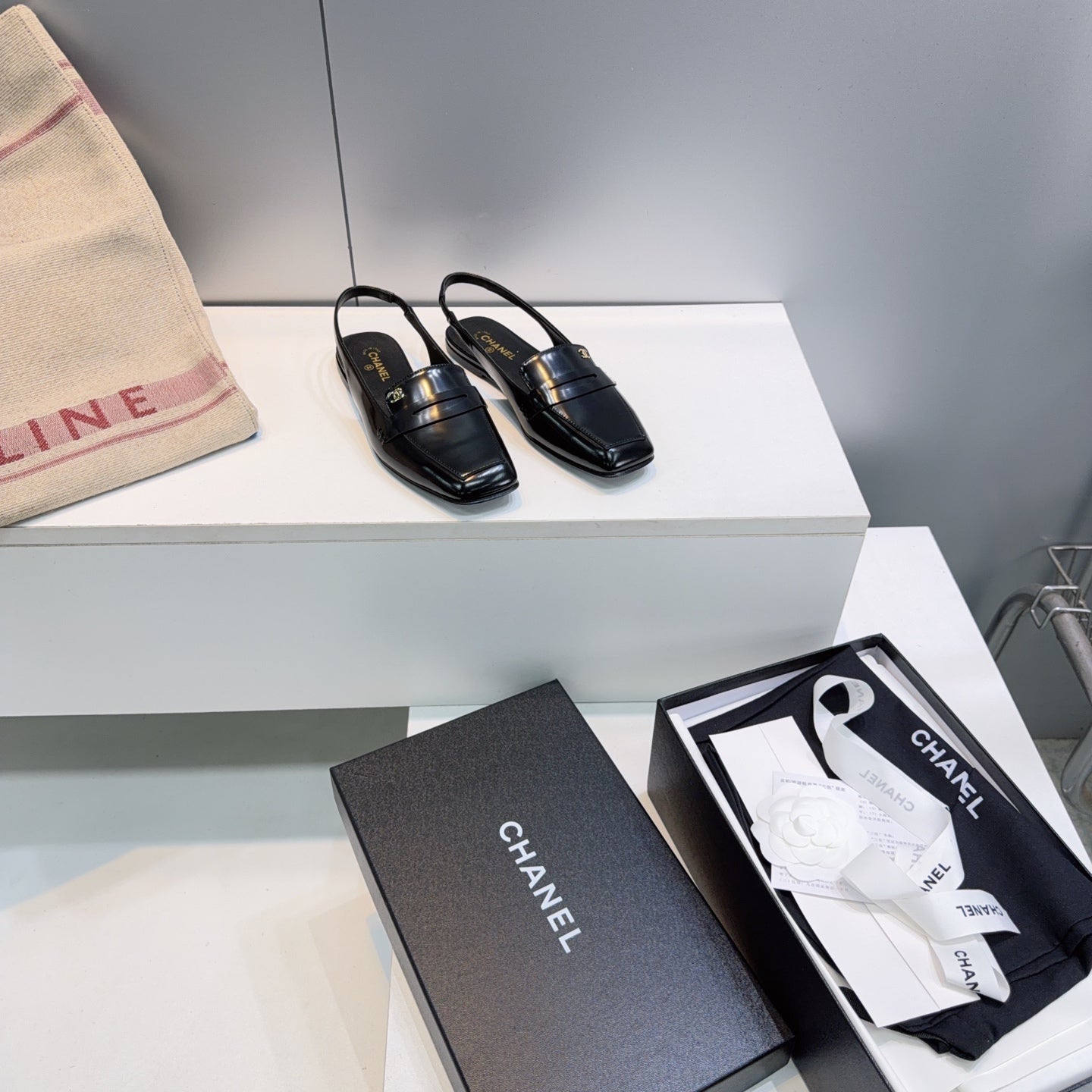 CHANEL 26S SLINGBACK FLATS IN BLACK PATENT LAMBSKIN