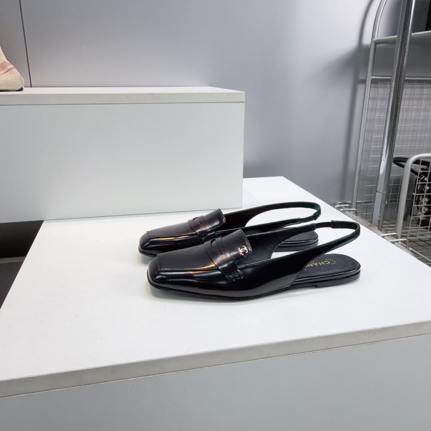 CHANEL 26S SLINGBACK FLATS IN BLACK PATENT LAMBSKIN