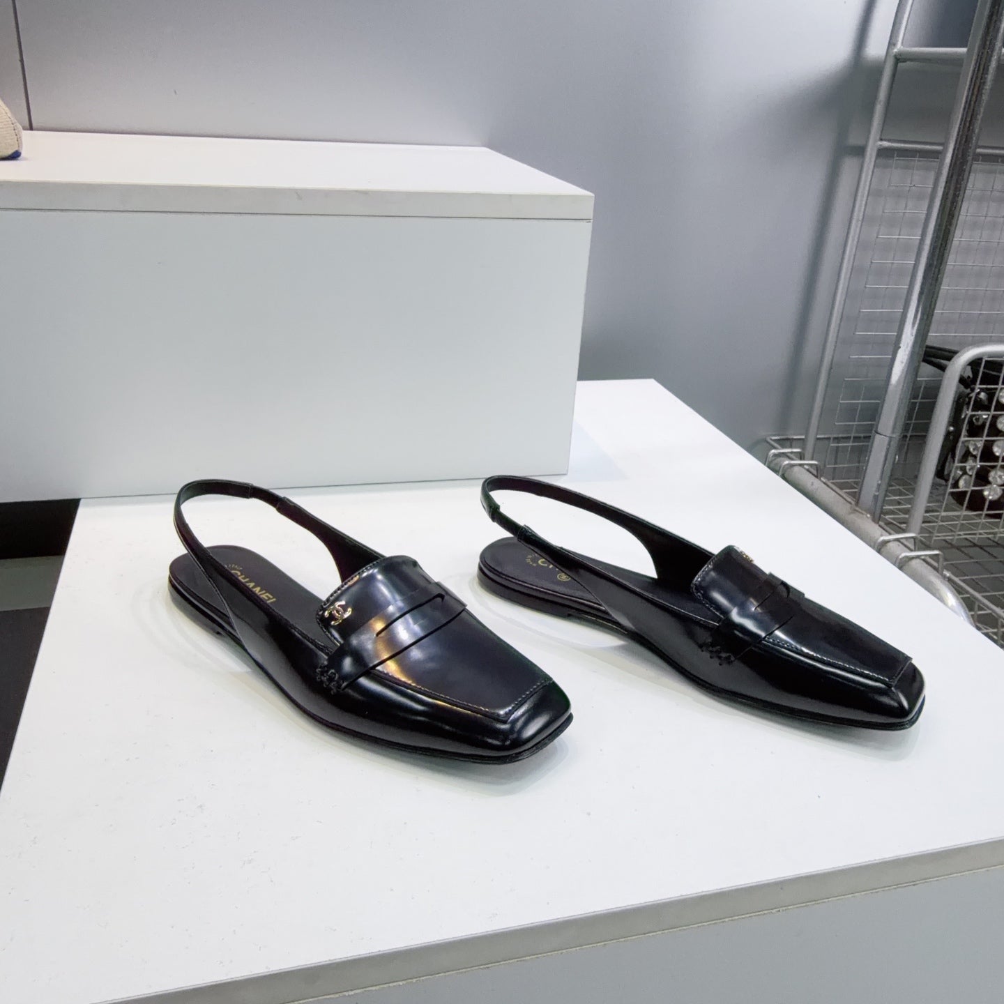 CHANEL 26S SLINGBACK FLATS IN BLACK PATENT LAMBSKIN