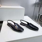 CHANEL 26S SLINGBACK FLATS IN BLACK PATENT LAMBSKIN