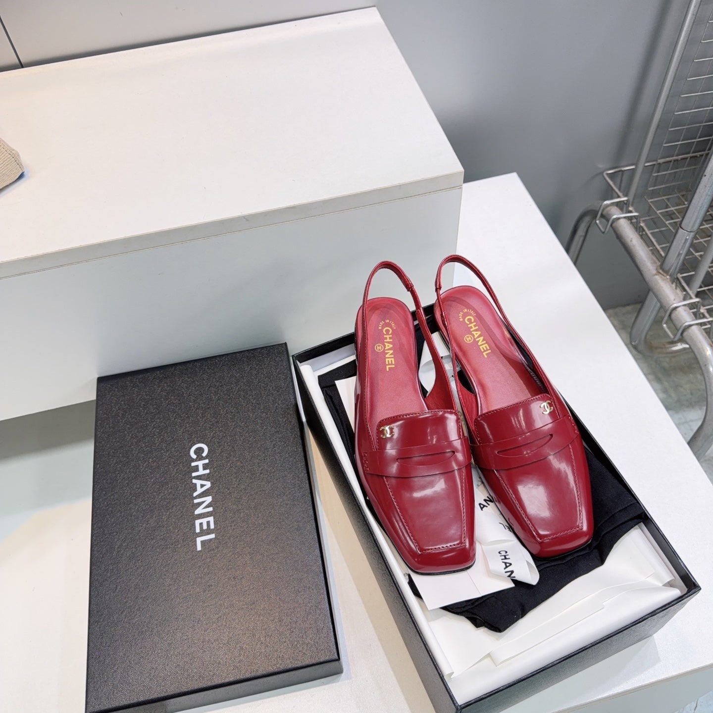 CHANEL 26S SLINGBACK FLATS IN BURGUNDY PATENT LAMBSKIN