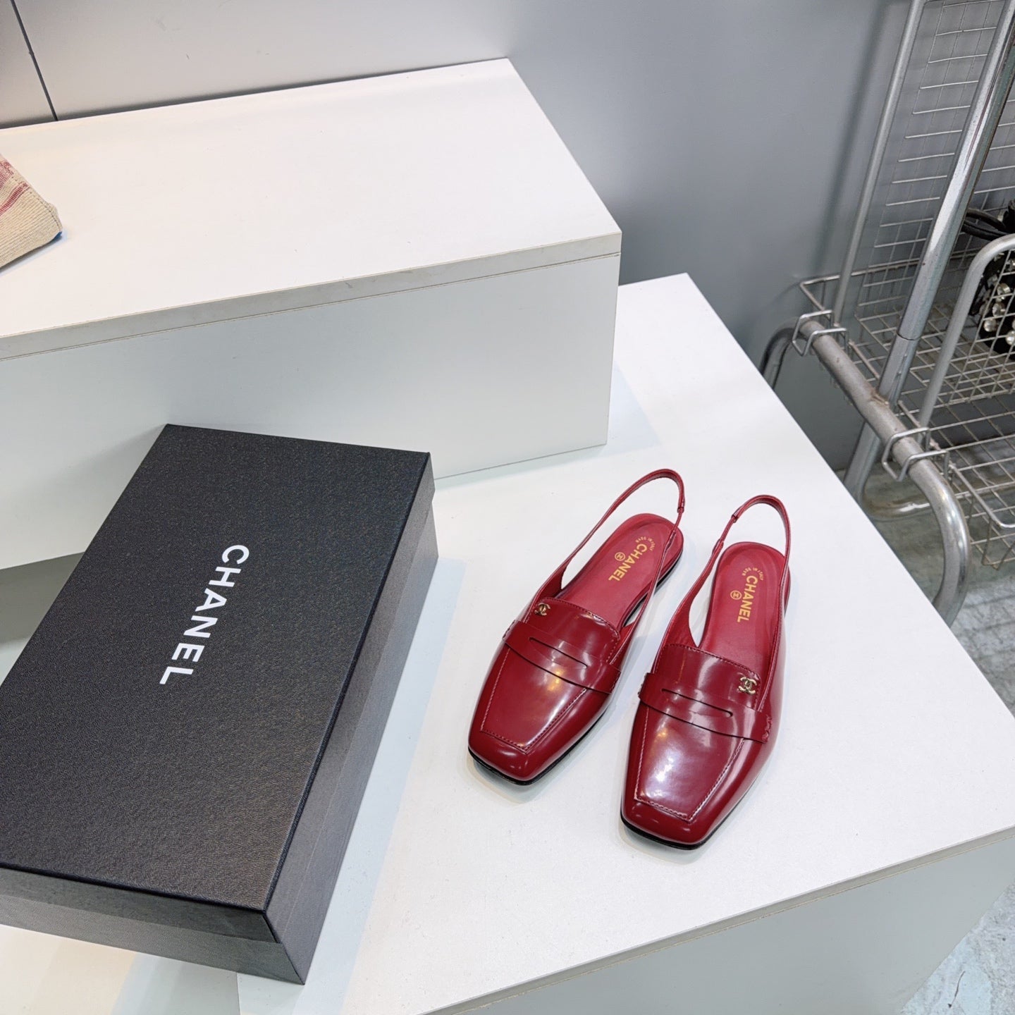 CHANEL 26S SLINGBACK FLATS IN BURGUNDY PATENT LAMBSKIN