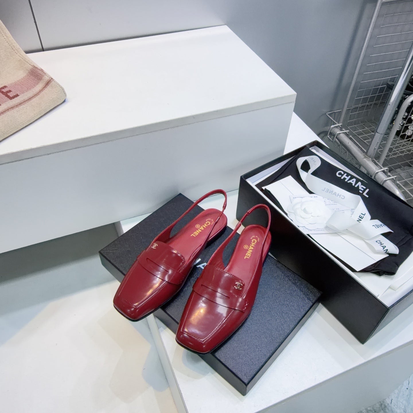 CHANEL 26S SLINGBACK FLATS IN BURGUNDY PATENT LAMBSKIN
